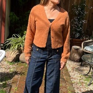 Rust fuzzy cropped sweater by Art class.